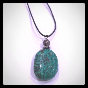 Genuine Turquoise Pendant w/ Black Leather Strand.